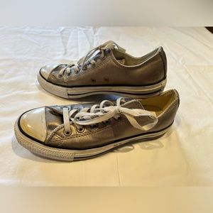 Metallic gold low top converse, size 8.5 women’s.